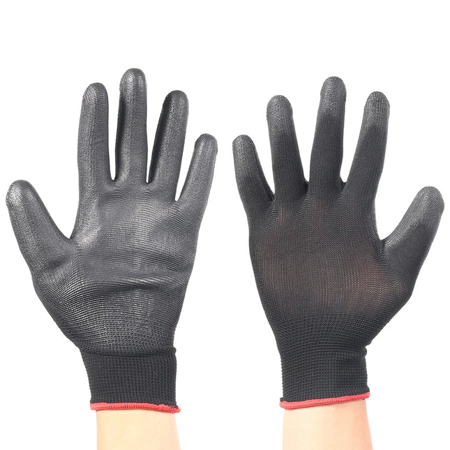 Pair of black gloves with textured palm on a white background
