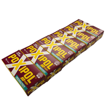 Multiple boxes of Poxipol on a white background