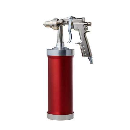 Red spray gun with silver nozzle on a white background